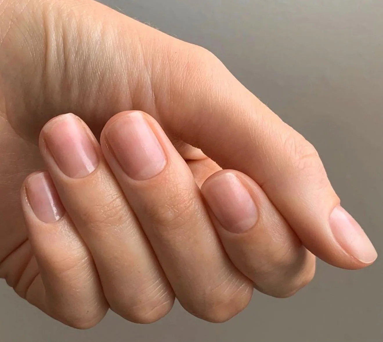 Healthy, well-groomed natural nails with a soft natural shine
